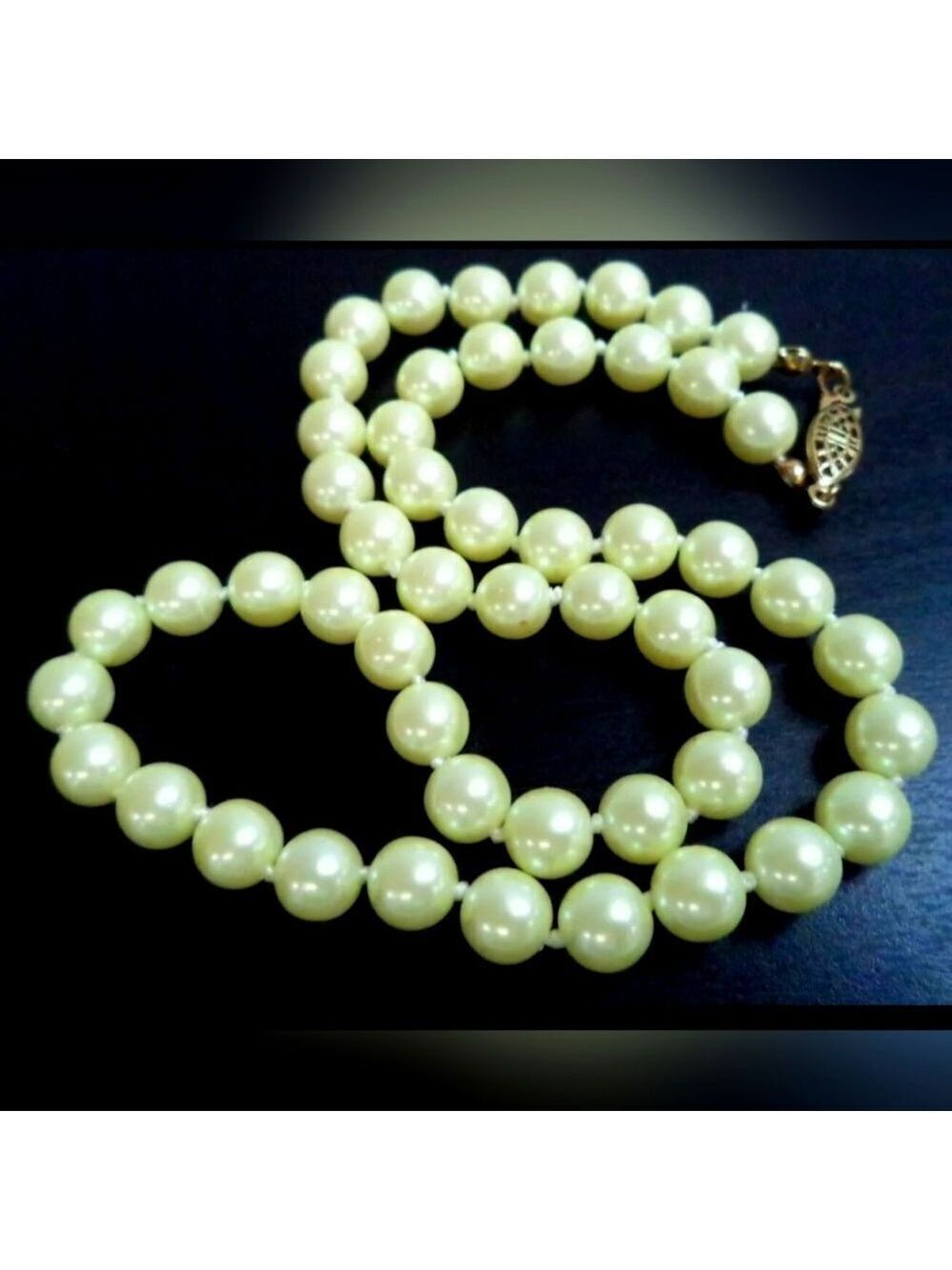 AVON IND KNOT YELLOW PEARL NECKLACE